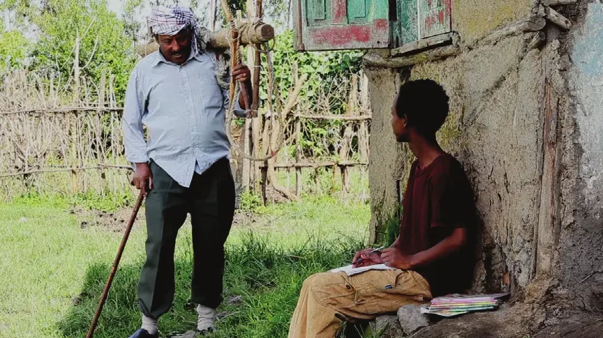 Video still: farmers in a field during an ICM nutrition programme film